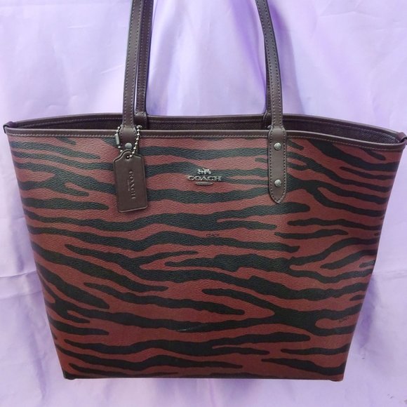 Coach Handbags - Coach City Reversible Tiger Print Dark Red Tote